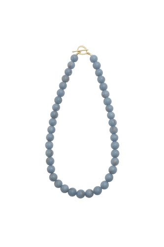 Necklace with blue beads on a white background