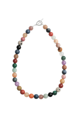Multicolored beaded necklace with silver clasp on a white background